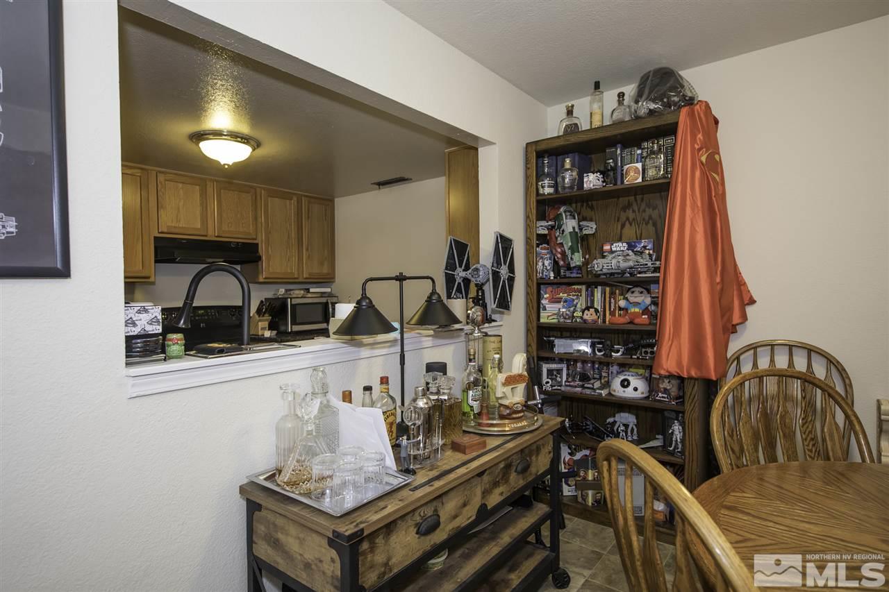 13860 Lear Boulevard Reno, NV 89506 - Photo 6 of 22 a view of a kitchen with a sink and cabinets