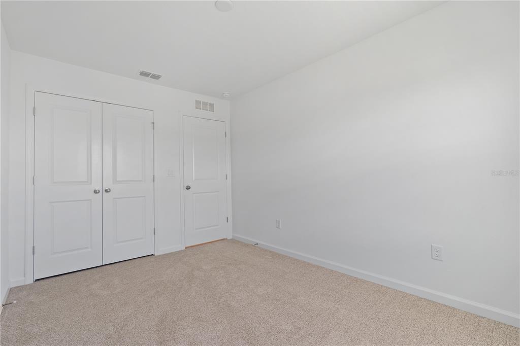 1141 Seaside Mist Trail Kissimmee, FL 34747 - Photo 19 of 30 a view of an empty room