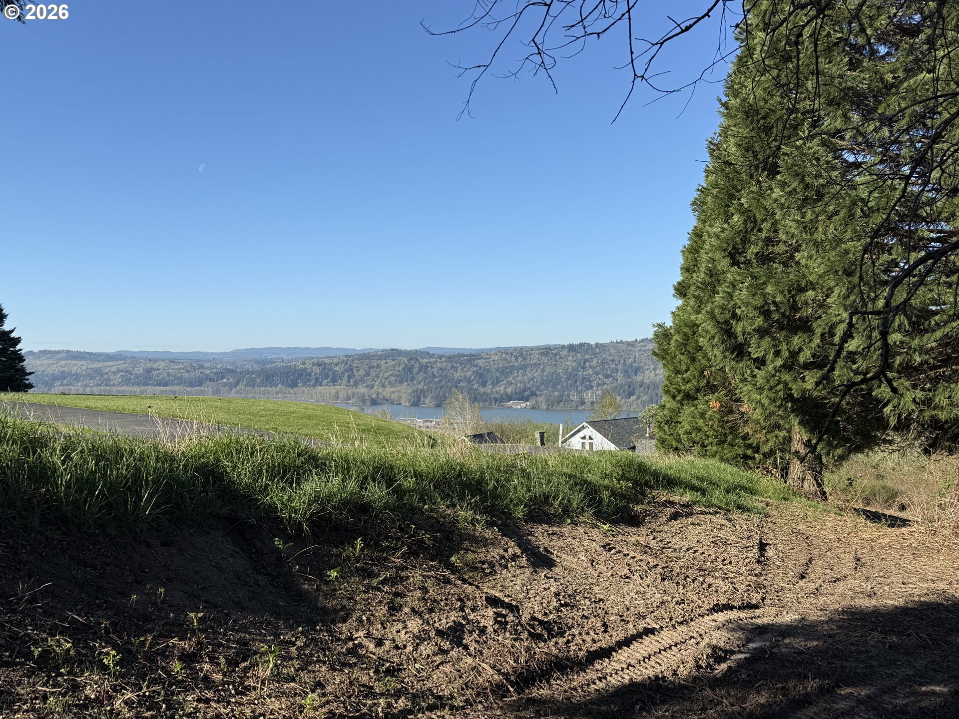 420 Topeka Road Kelso, WA 98626 - Photo 23 of 24 a view of a lake with lots of trees