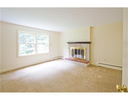 373 Middle Road Falmouth, ME 04105 - Photo 15 of 25 Bedroom. Wood burning fireplace in...