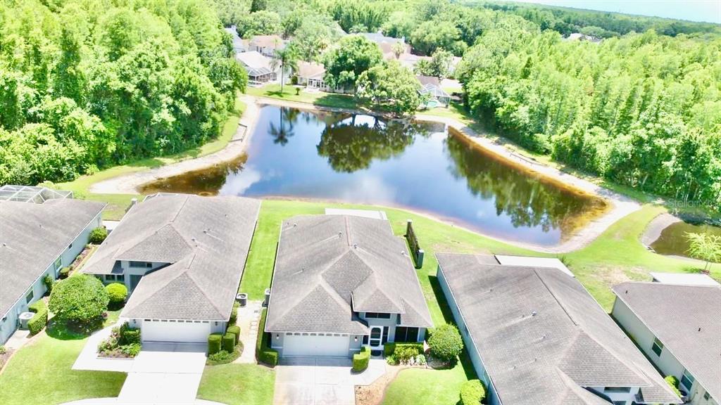 7842 Tenby Court New Port Richey, FL 34655 - Photo 24 of 27 an aerial view of a house with outdoor space