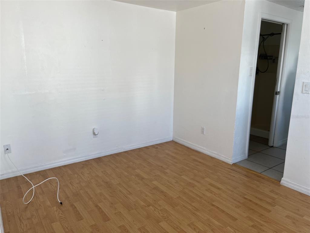 611 Ora Street, Unit 4 Daytona Beach, FL 32118 - Photo 5 of 8 a view of an empty room