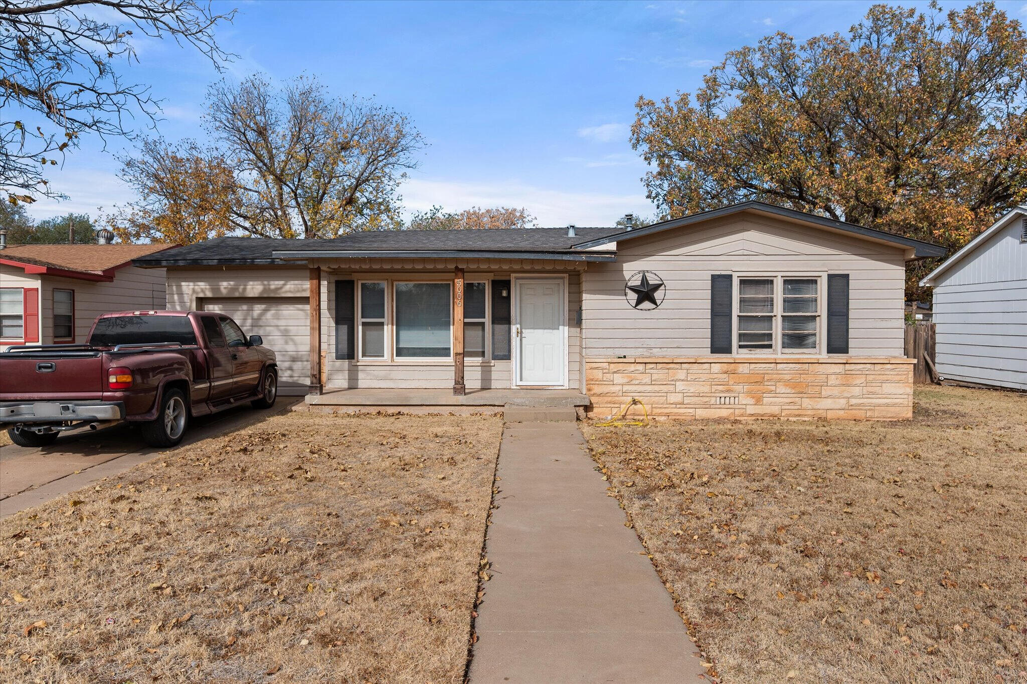 5006 42nd Street Lubbock, TX 79414 - Photo 19 of 19 a house view with a outdoor space