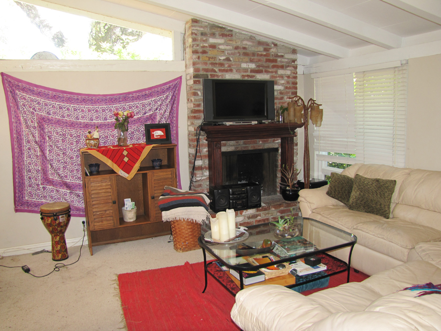 854 Fellowship Road Santa Barbara, CA 93109 - Photo 4 of 12 a living room with furniture a flat screen tv and a fireplace