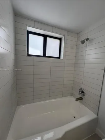 a bathroom with a bathtub