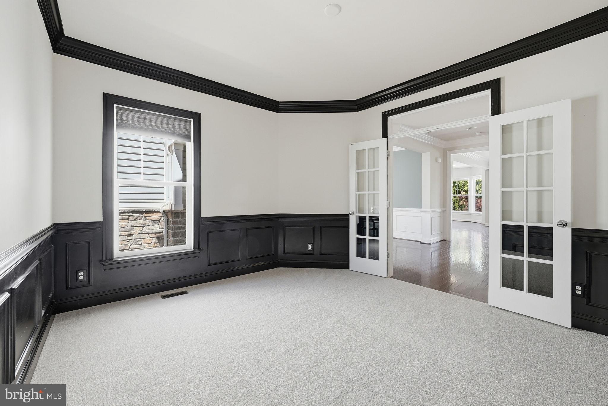 42330 Christophers View Terrace Ashburn, VA 20148 - Photo 17 of 46 a view of an empty room with a cabinet and a window