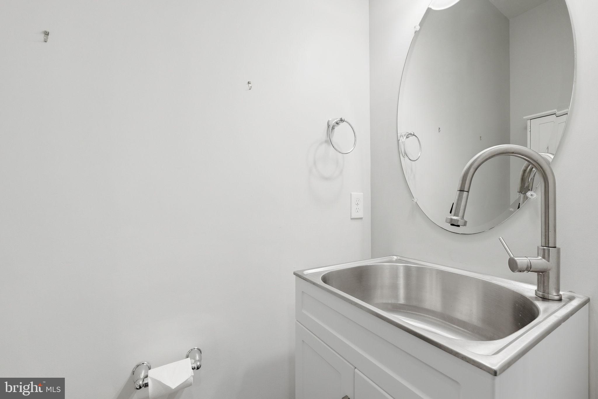 42330 Christophers View Terrace Ashburn, VA 20148 - Photo 19 of 46 a close view of sink and tap