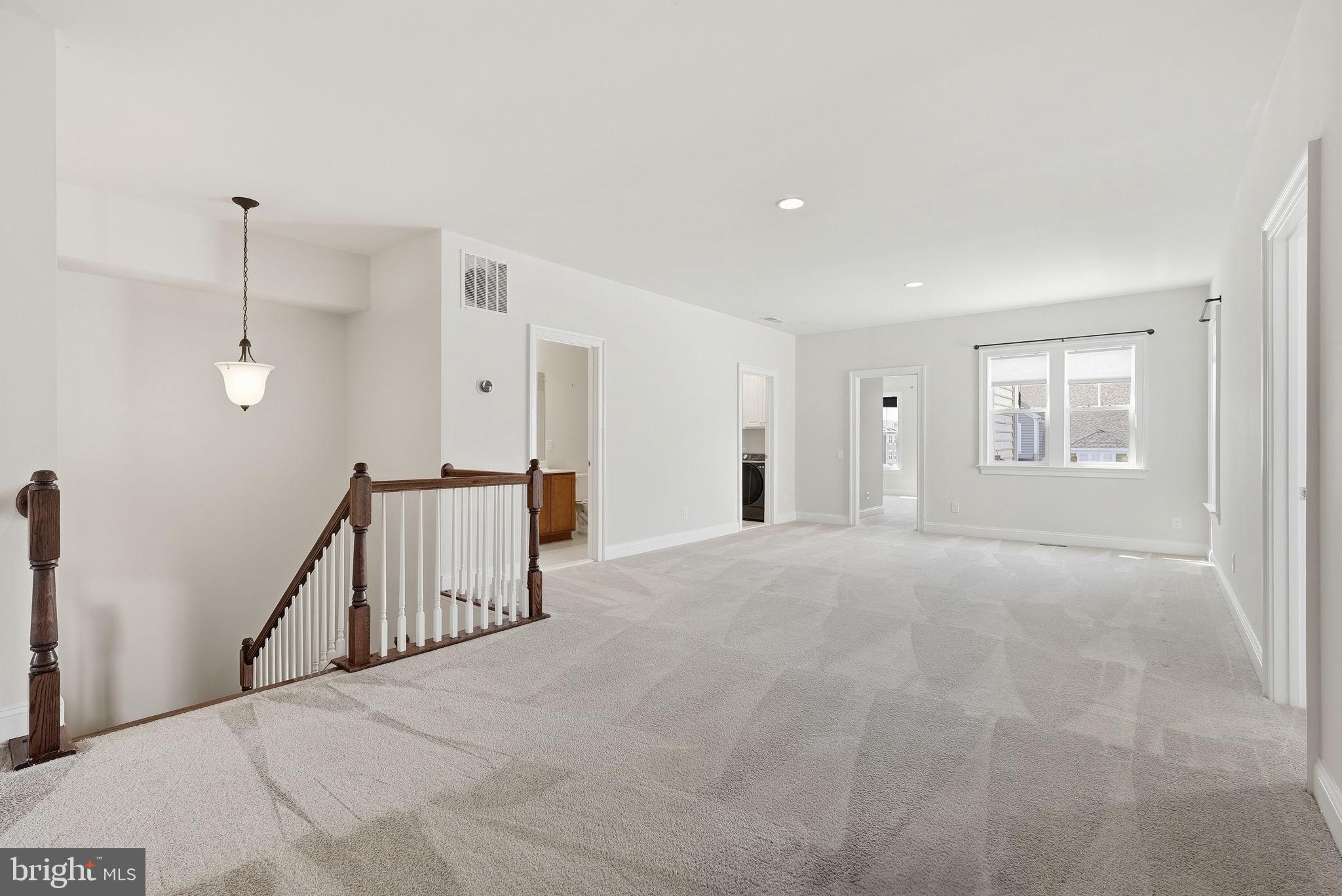 42330 Christophers View Terrace Ashburn, VA 20148 - Photo 20 of 46 a view of an empty room with a window