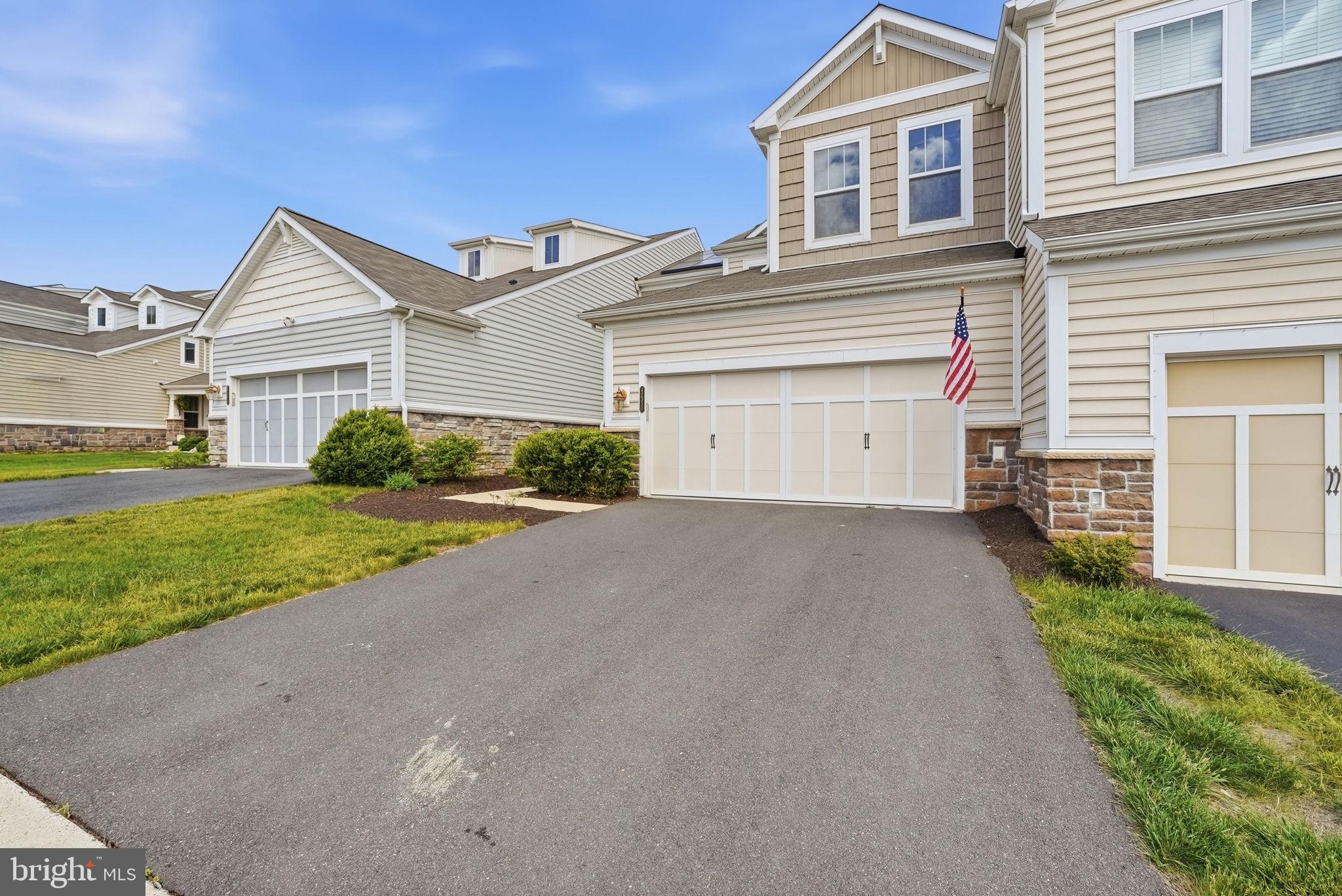 42330 Christophers View Terrace Ashburn, VA 20148 - Photo 2 of 46 a view of a house with a yard