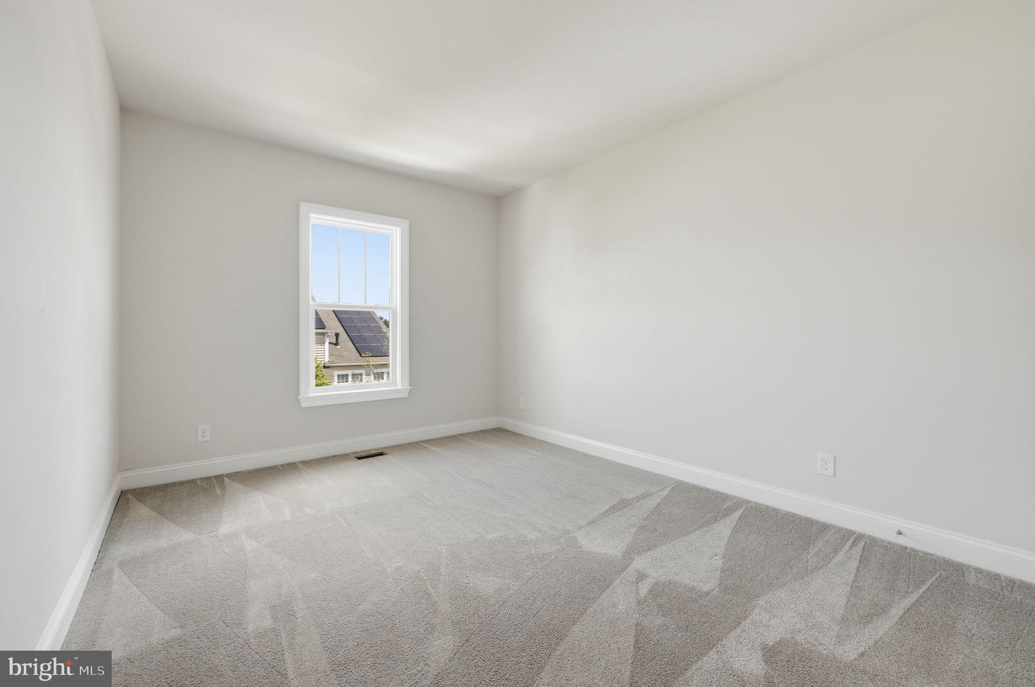 42330 Christophers View Terrace Ashburn, VA 20148 - Photo 26 of 46 an empty room with windows
