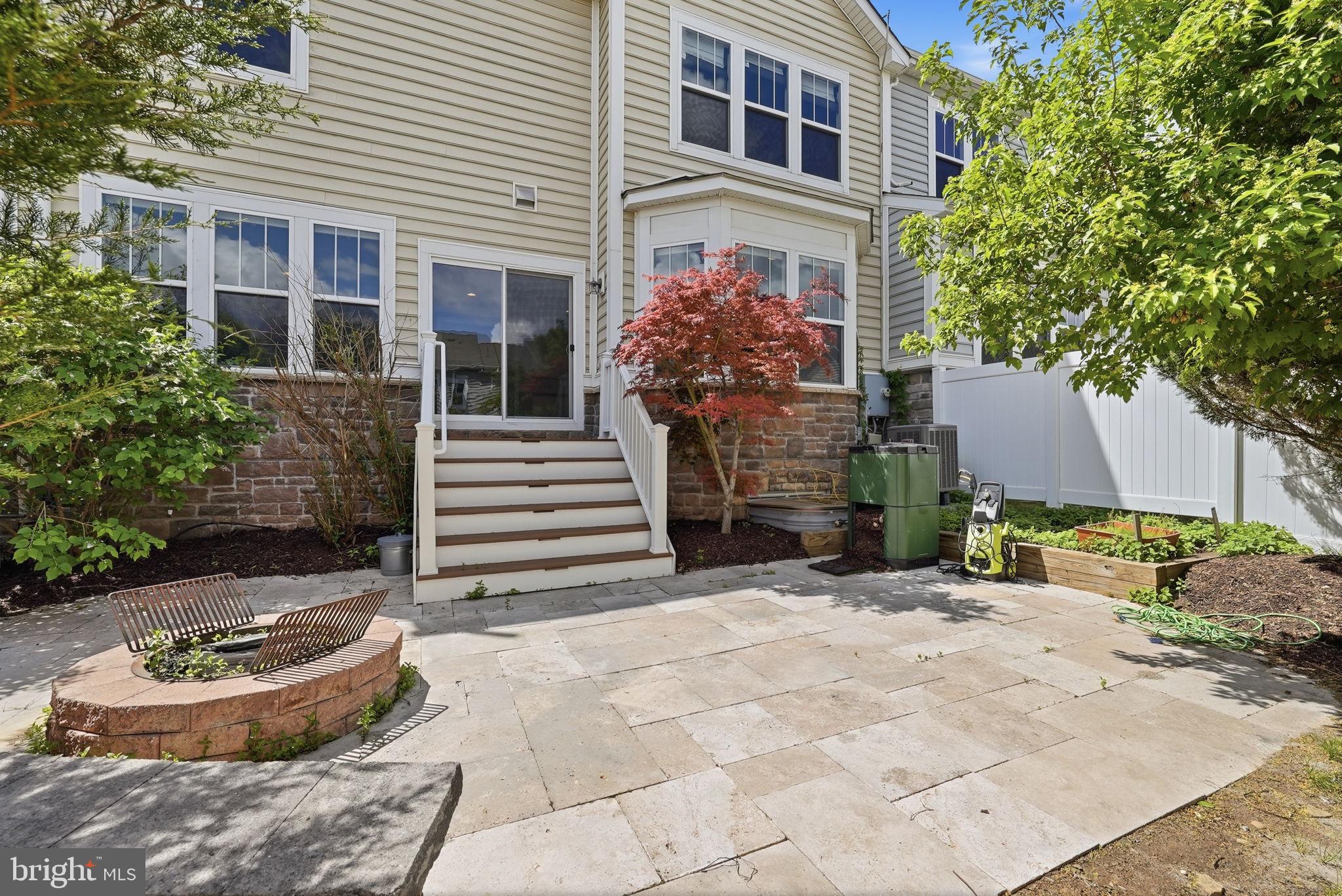 42330 Christophers View Terrace Ashburn, VA 20148 - Photo 41 of 46 a front view of a house with a tree