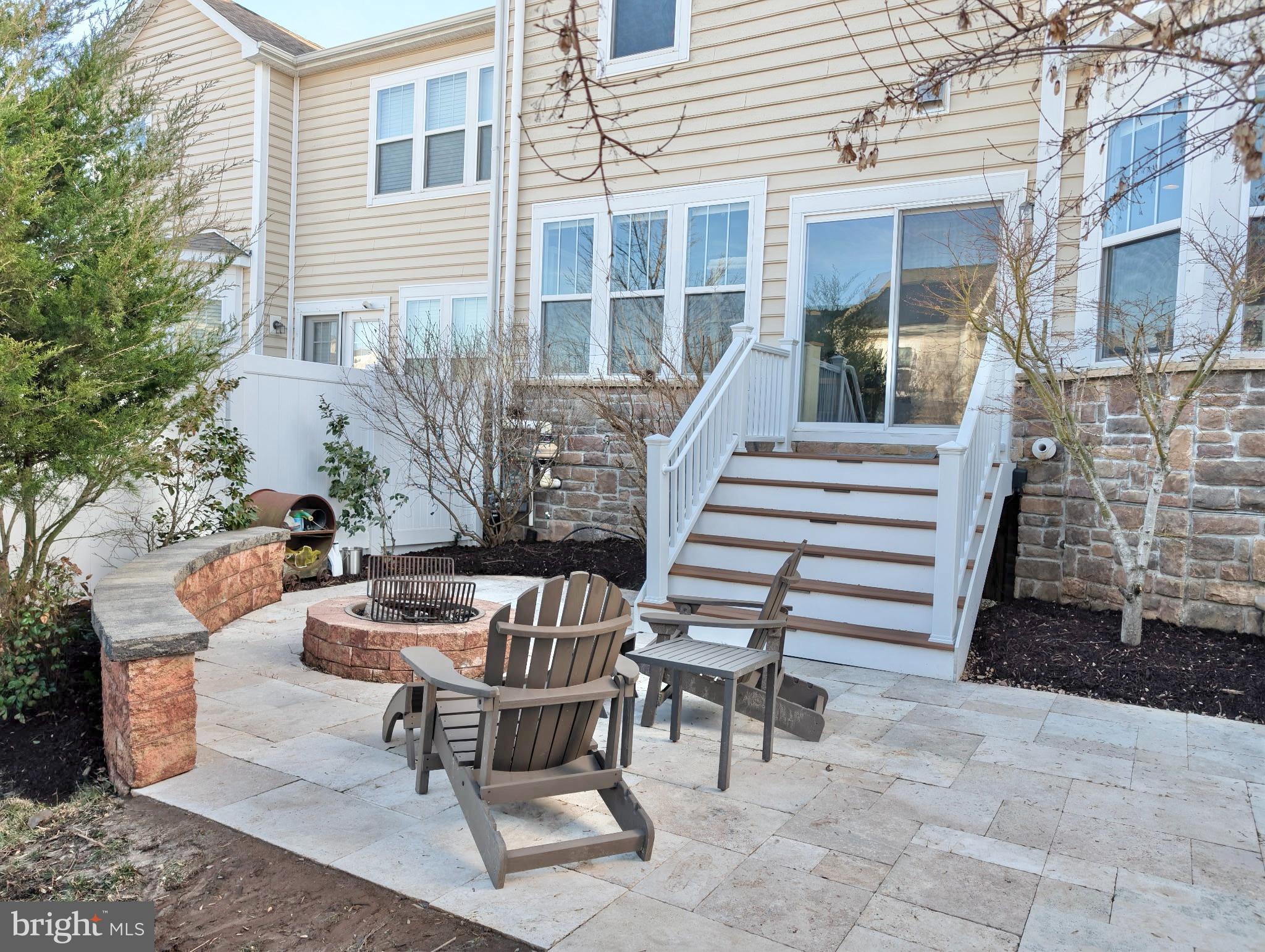 42330 Christophers View Terrace Ashburn, VA 20148 - Photo 6 of 7 a view of a patio with a table and chairs