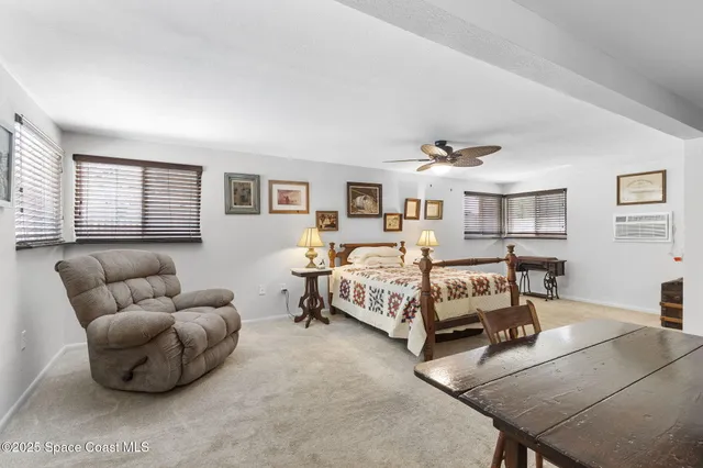 a bedroom with furniture and a couch