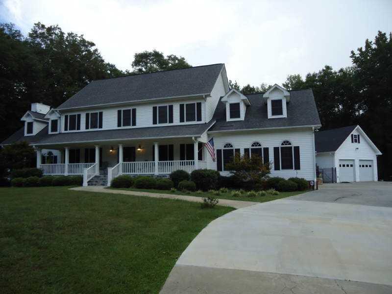 1460 Oak Grove Road Carrollton, GA 30117 - Photo 1 of 1 Exterior Front. Beautiful home on 6.48 acres. Has radio controlled security system, in-house vacuum, Pella windows, solar screens, geo-thermal heat pump,& custom upgrades throughout the house.