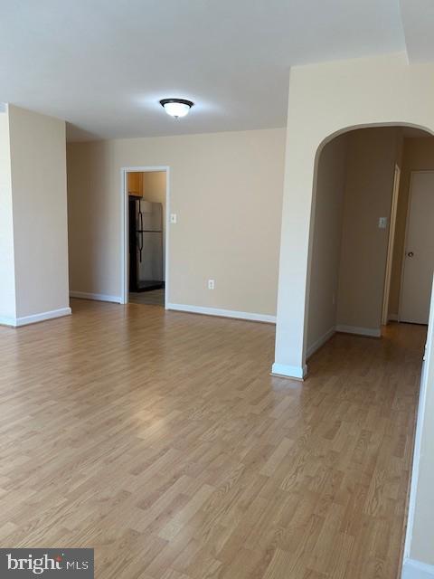 1121 Arlington Boulevard, Unit 807 Arlington, VA 22209 - Photo 6 of 8 a view of a livingroom with wooden floor