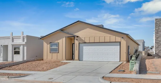 a view of a house with garage