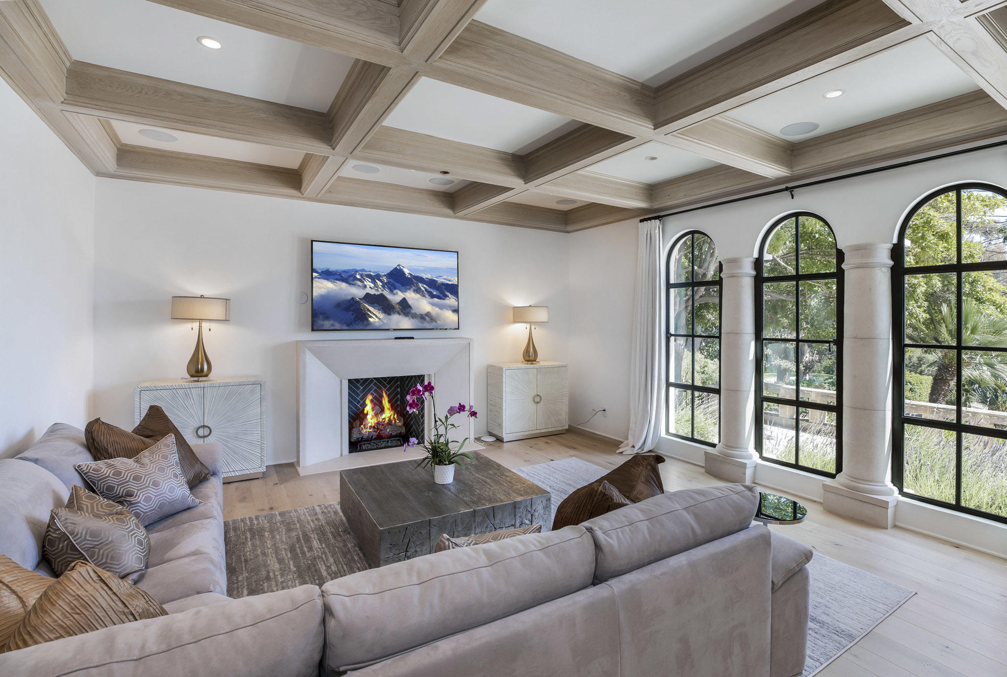 1084 Golf Road Montecito, CA 93108 - Photo 13 of 47 a living room with furniture fireplace and a large window