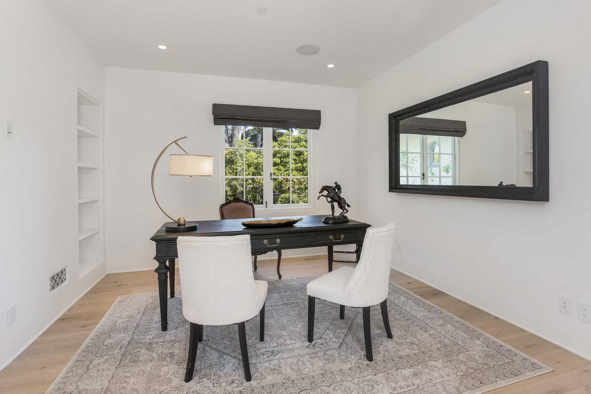 1084 Golf Road Montecito, CA 93108 - Photo 20 of 47 a view of a room with a table and a chair