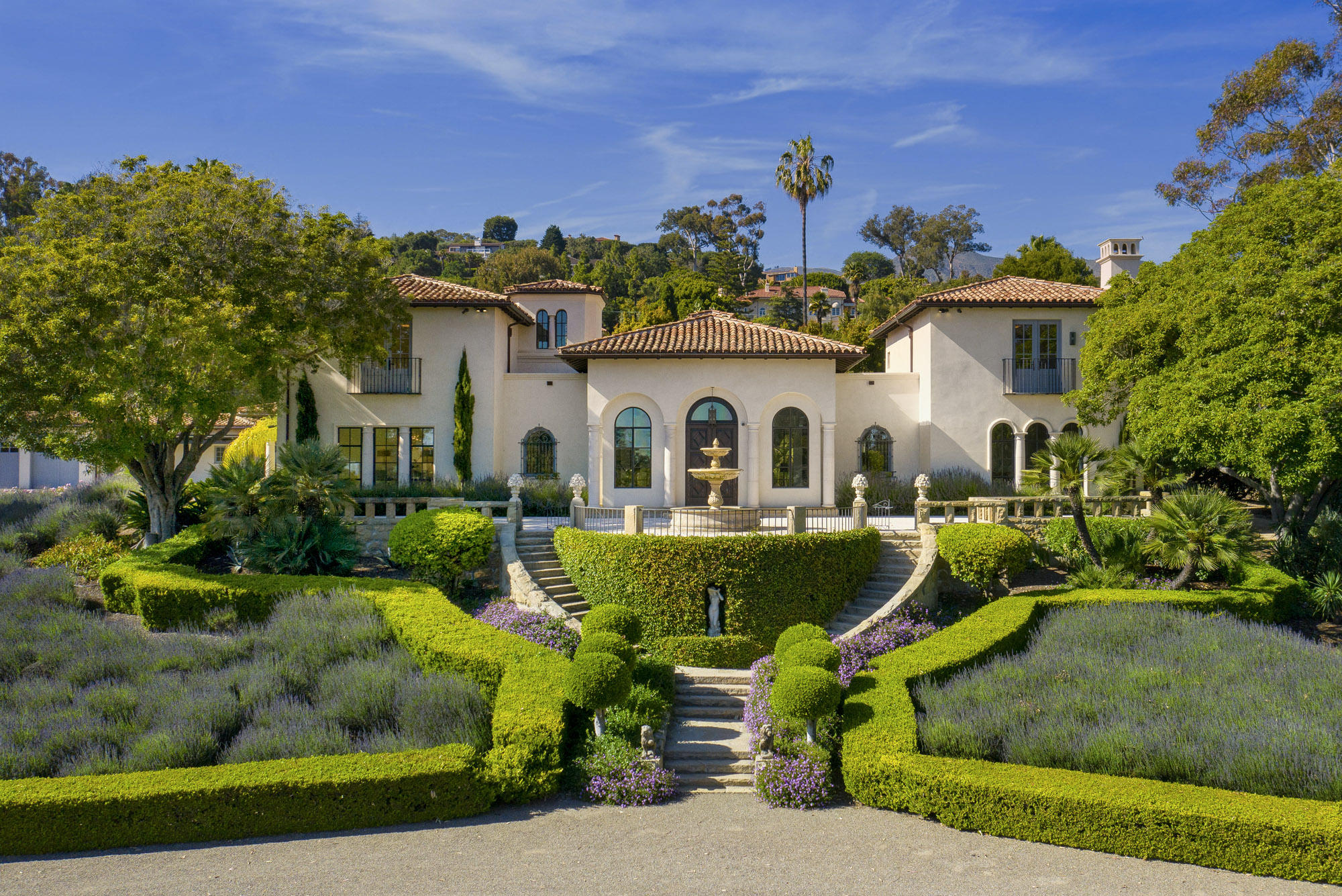 1084 Golf Road Montecito, CA 93108 - Photo 2 of 47 a front view of a house with a yard