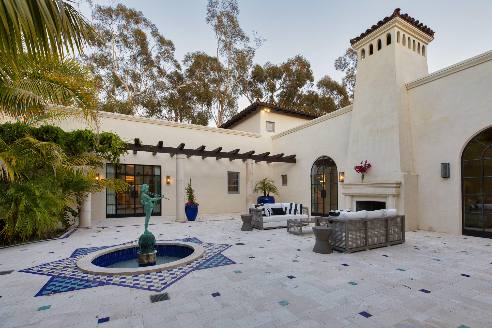 1084 Golf Road Montecito, CA 93108 - Photo 21 of 47 a front view of a house with garden