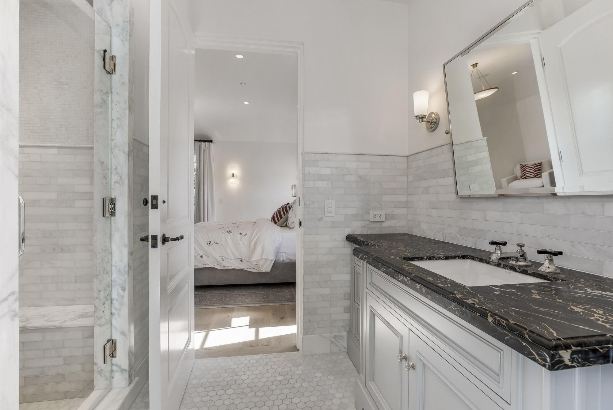 1084 Golf Road Montecito, CA 93108 - Photo 26 of 47 a bathroom with a sink and a mirror