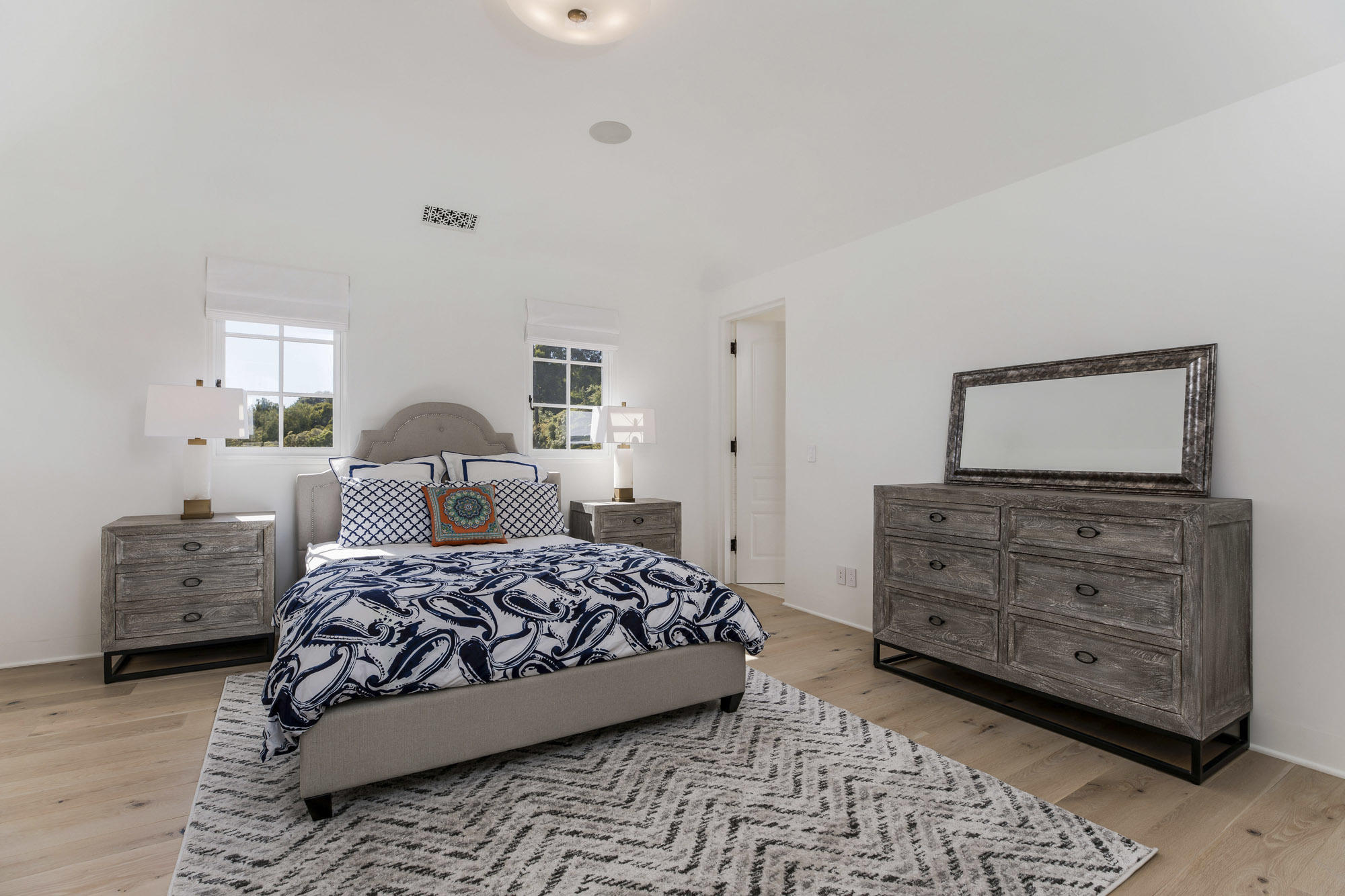 1084 Golf Road Montecito, CA 93108 - Photo 27 of 47 a bedroom with a bed and furniture