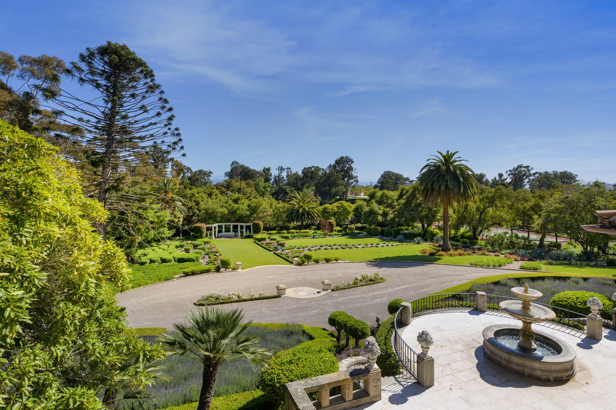 1084 Golf Road Montecito, CA 93108 - Photo 3 of 47 a view of a backyard with plants and swimming pool