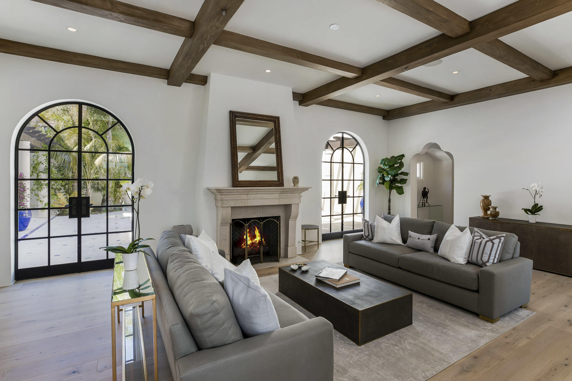 1084 Golf Road Montecito, CA 93108 - Photo 5 of 47 a living room with furniture a fireplace and a flat screen tv