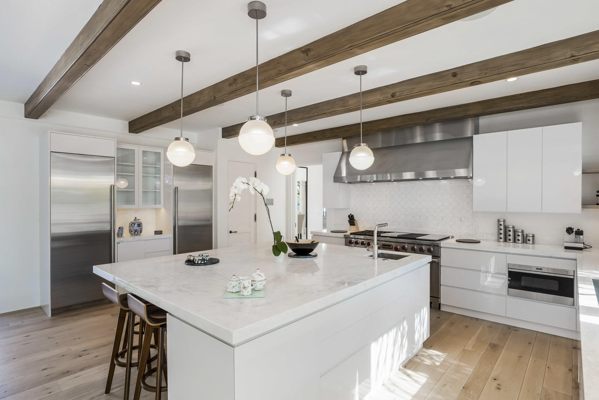 1084 Golf Road Montecito, CA 93108 - Photo 9 of 47 a kitchen with stainless steel appliances a sink a stove a refrigerator and cabinets