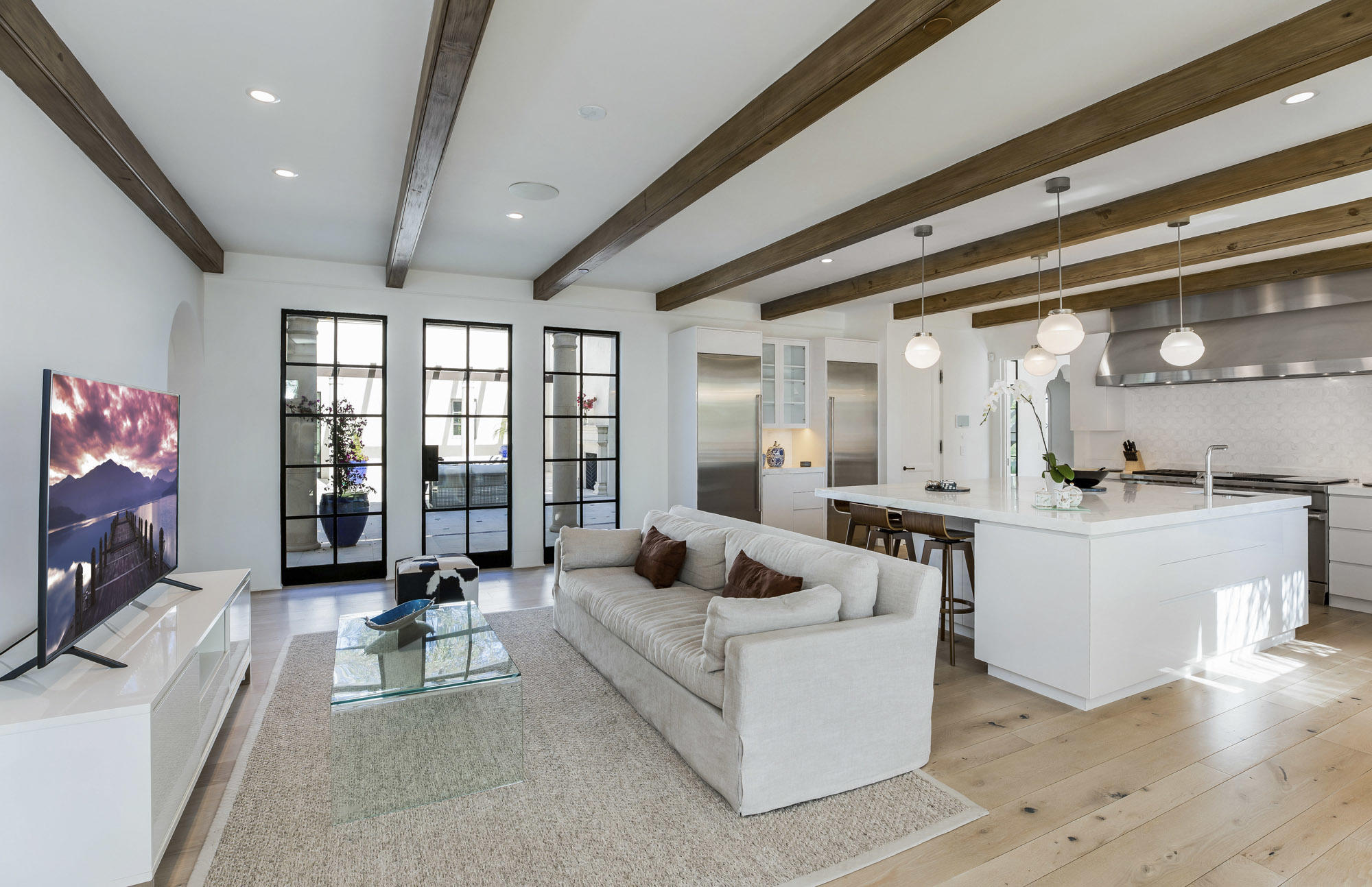 1084 Golf Road Montecito, CA 93108 - Photo 10 of 47 a living room with furniture and flat screen tv