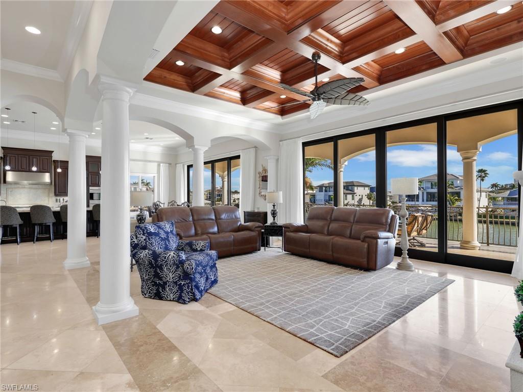 264 Bayview Avenue Naples, FL 34108 - Photo 14 of 50 a living room with furniture and a large window