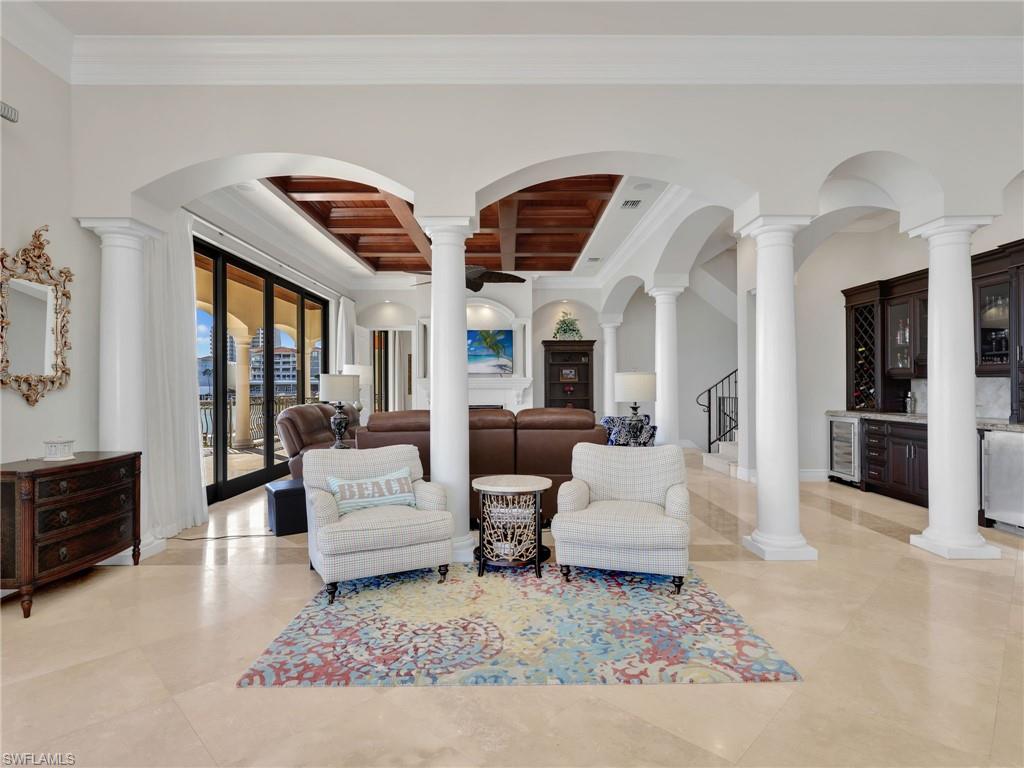 264 Bayview Avenue Naples, FL 34108 - Photo 16 of 50 a living room with furniture fireplace and flat screen tv
