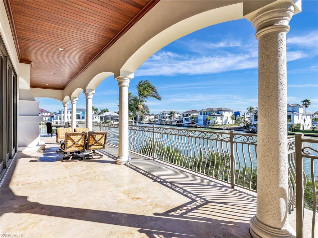 264 Bayview Avenue Naples, FL 34108 - Photo 23 of 50 a view of a balcony with chairs