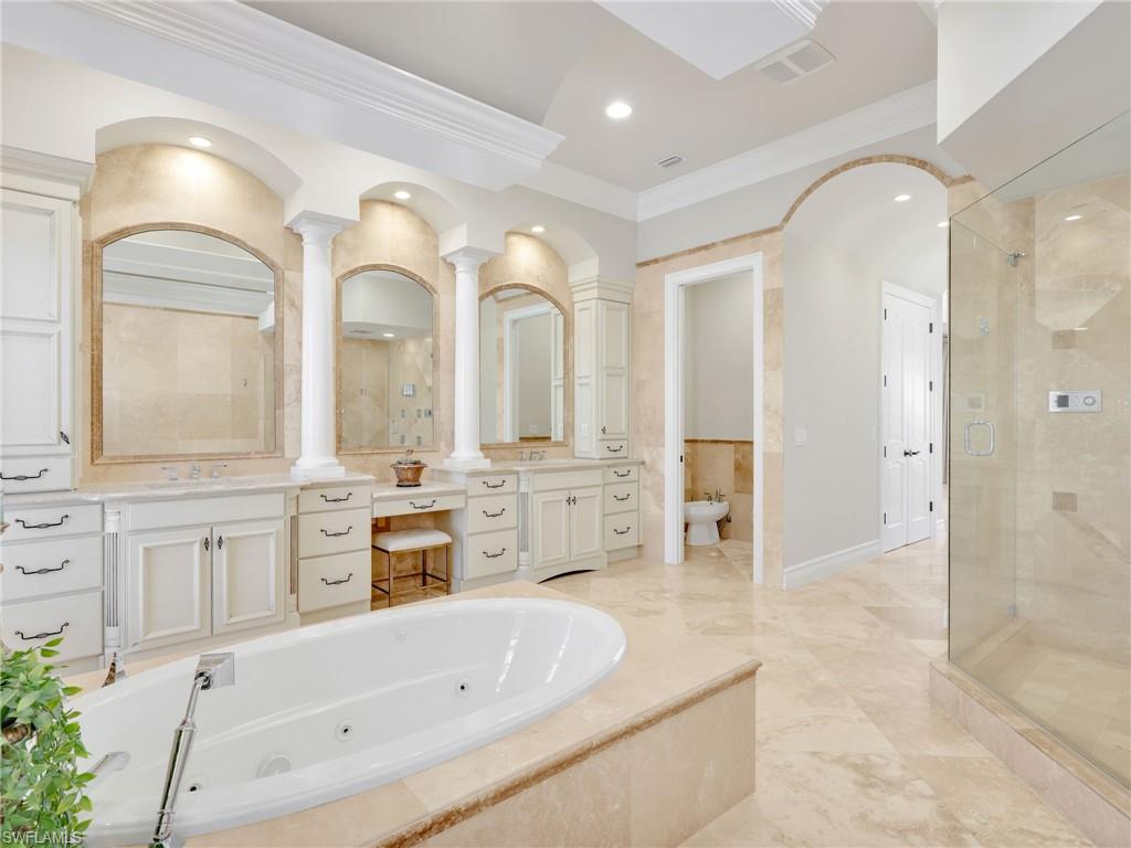 264 Bayview Avenue Naples, FL 34108 - Photo 29 of 50 a large spacious bathroom with a large tub shower and sink