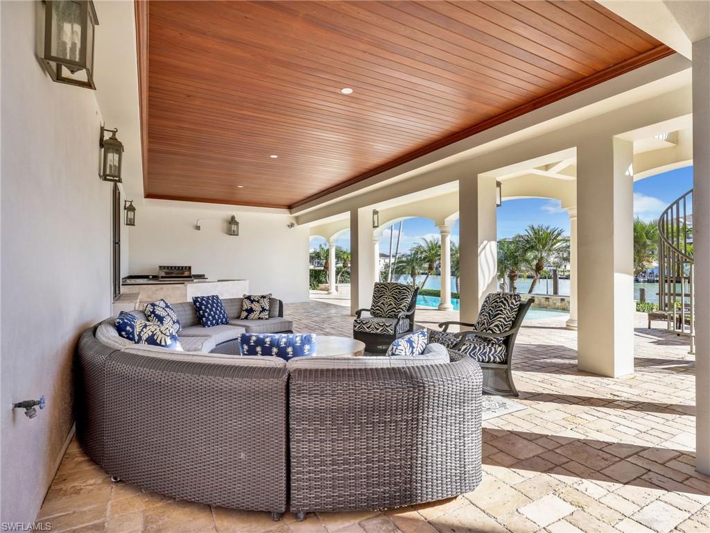 264 Bayview Avenue Naples, FL 34108 - Photo 7 of 50 a living room with couch