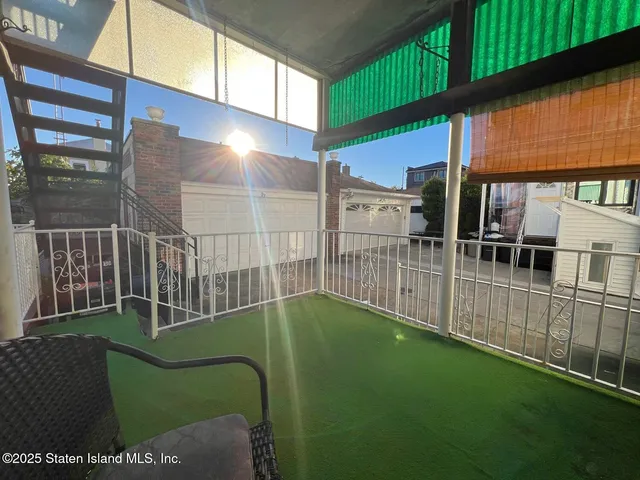 a view of a backyard with staircase