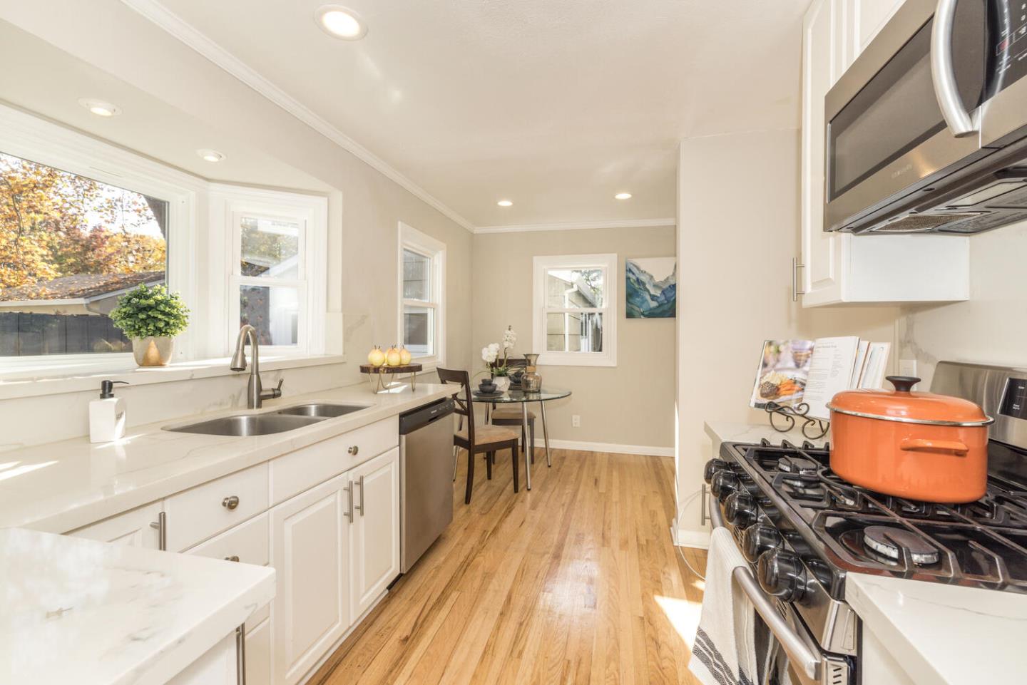 182 Rutherford Avenue Redwood City, CA 94061 - Photo 12 of 34 a kitchen with stove and sink