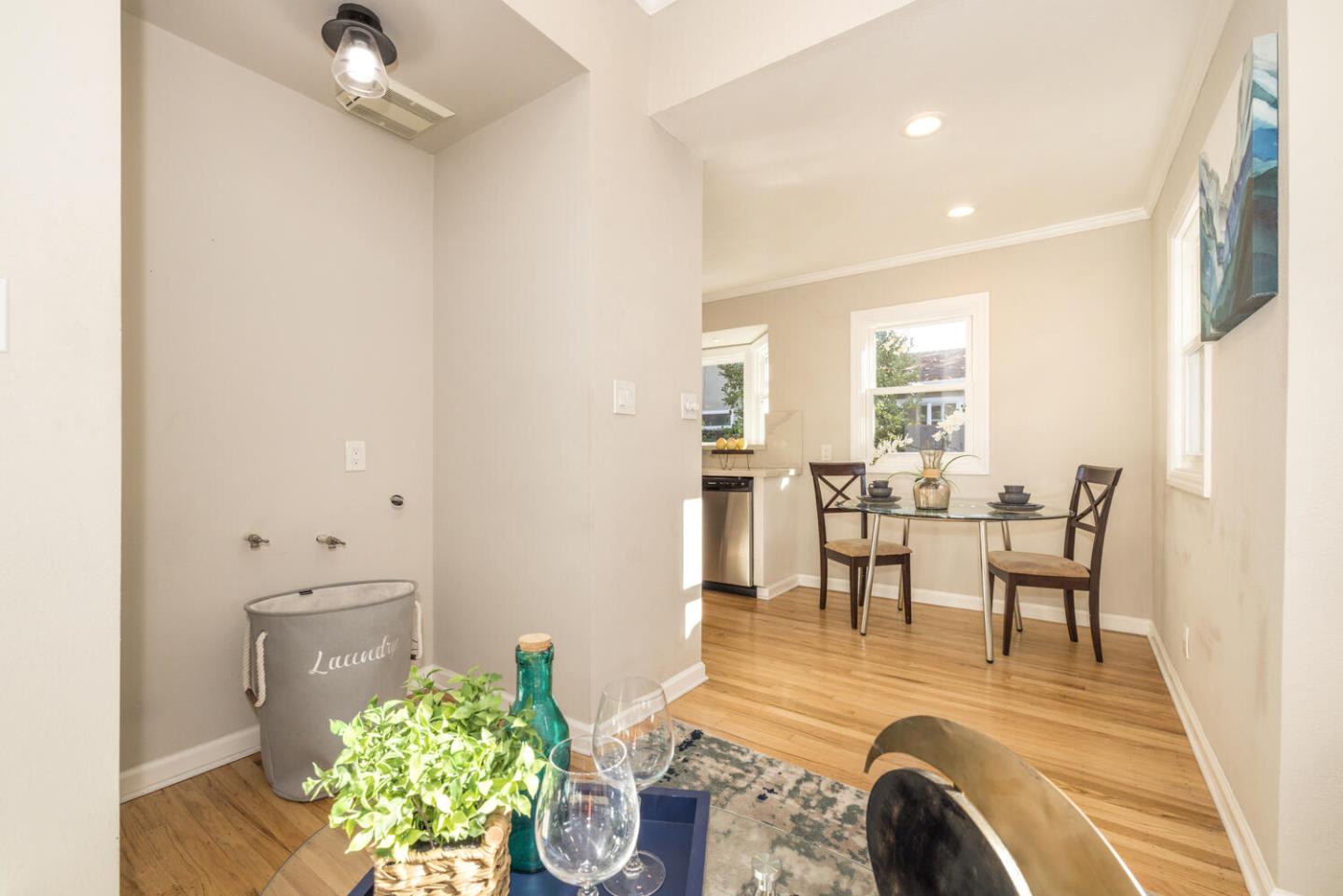 182 Rutherford Avenue Redwood City, CA 94061 - Photo 18 of 34 a view of a dining room with furniture and a floor to ceiling window