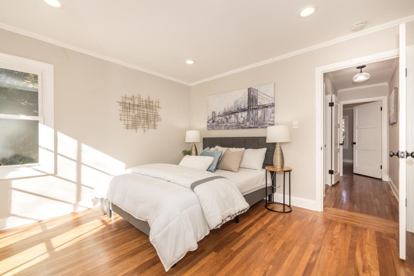 182 Rutherford Avenue Redwood City, CA 94061 - Photo 20 of 34 a bedroom with a bed and a large window