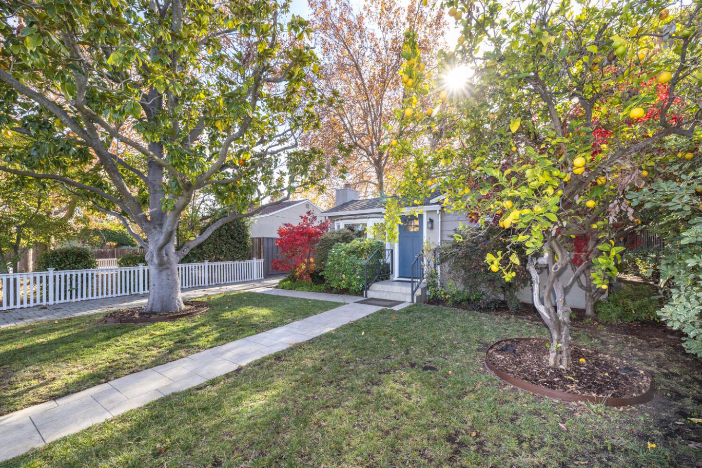 182 Rutherford Avenue Redwood City, CA 94061 - Photo 2 of 34 a front view of a house with a yard