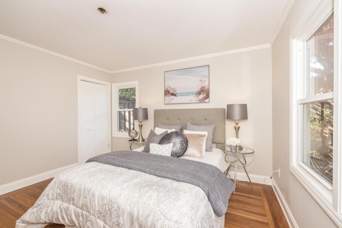 182 Rutherford Avenue Redwood City, CA 94061 - Photo 23 of 34 a bedroom with a bed and a window