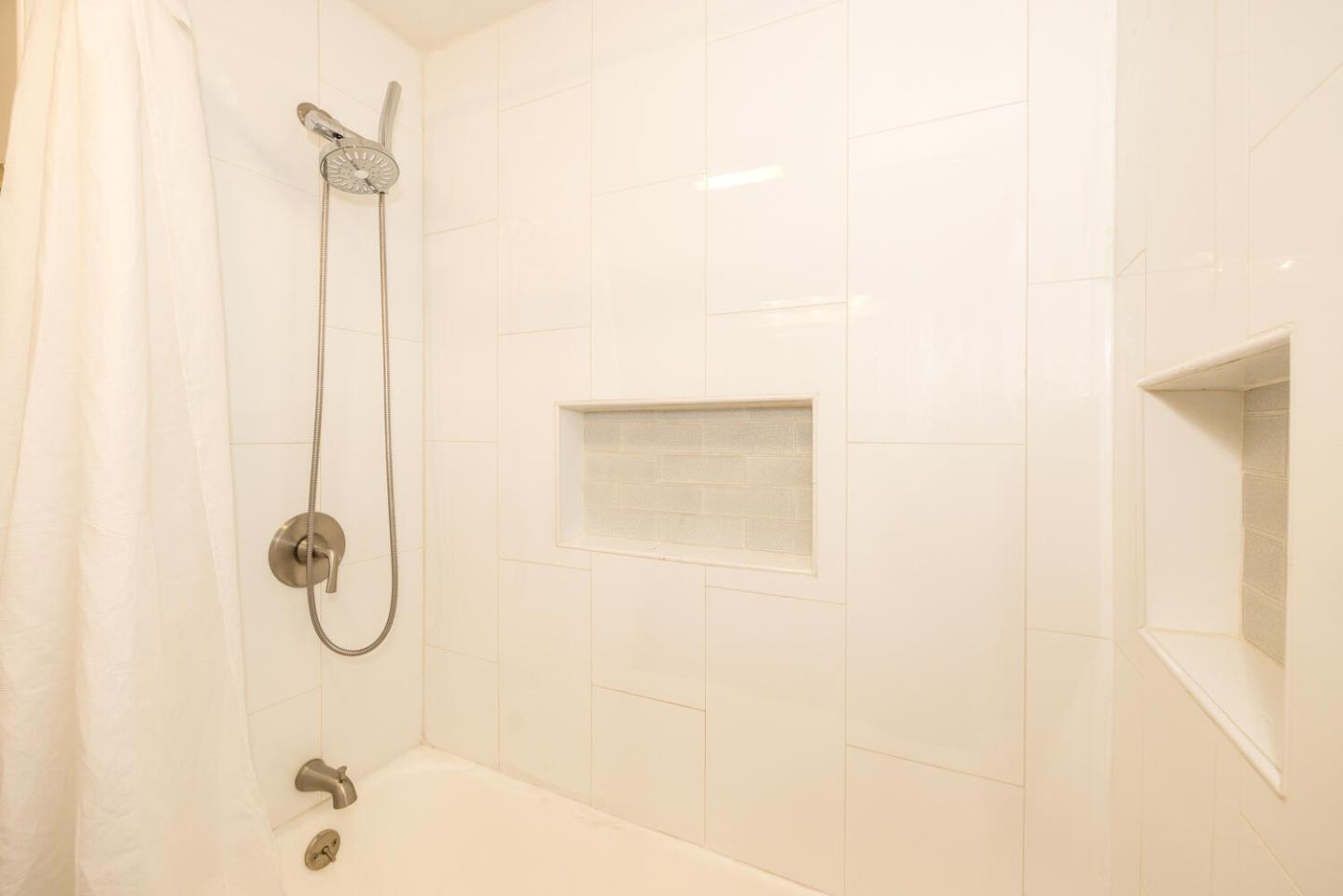 182 Rutherford Avenue Redwood City, CA 94061 - Photo 25 of 34 a bathroom with a shower