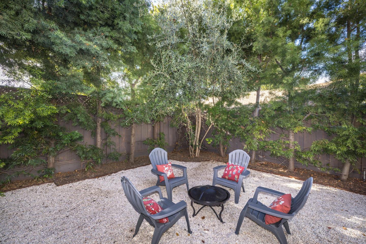 182 Rutherford Avenue Redwood City, CA 94061 - Photo 29 of 34 a backyard of a house with table and chairs