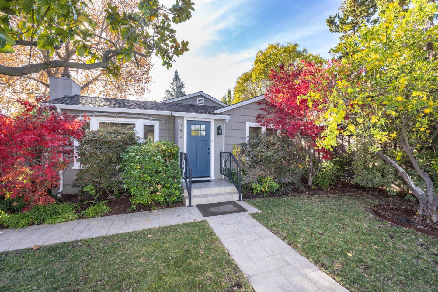 182 Rutherford Avenue Redwood City, CA 94061 - Photo 4 of 34 a front view of a house with a yard