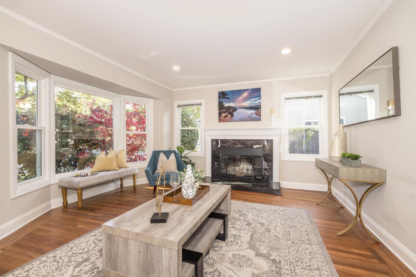 182 Rutherford Avenue Redwood City, CA 94061 - Photo 6 of 34 a living room with furniture and a fireplace