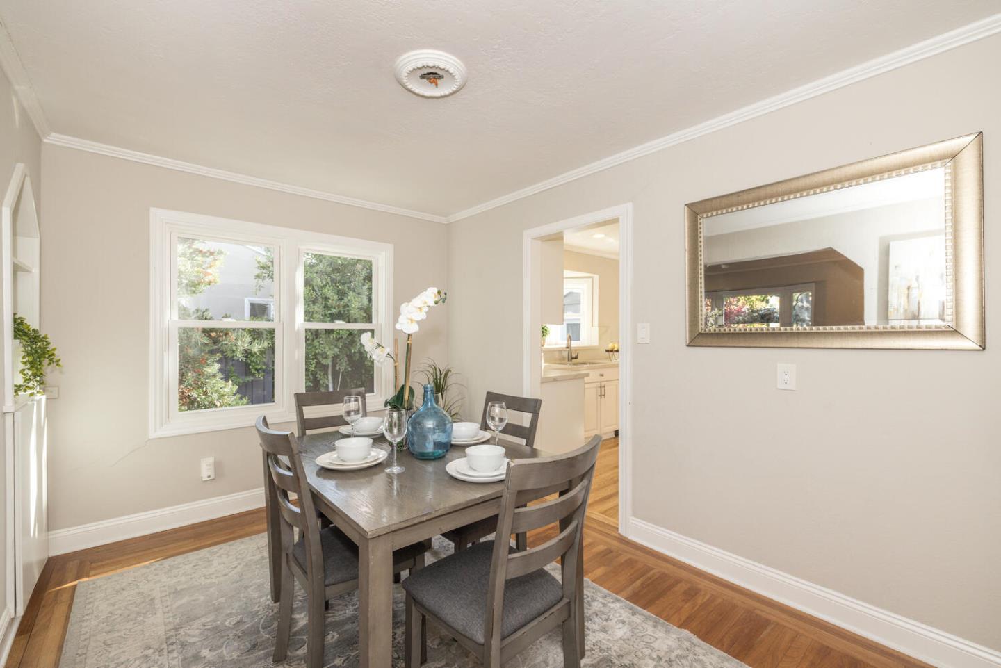 182 Rutherford Avenue Redwood City, CA 94061 - Photo 10 of 34 a view of a dining room with furniture window and outside view