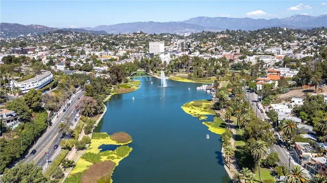 a view of a city with a lake