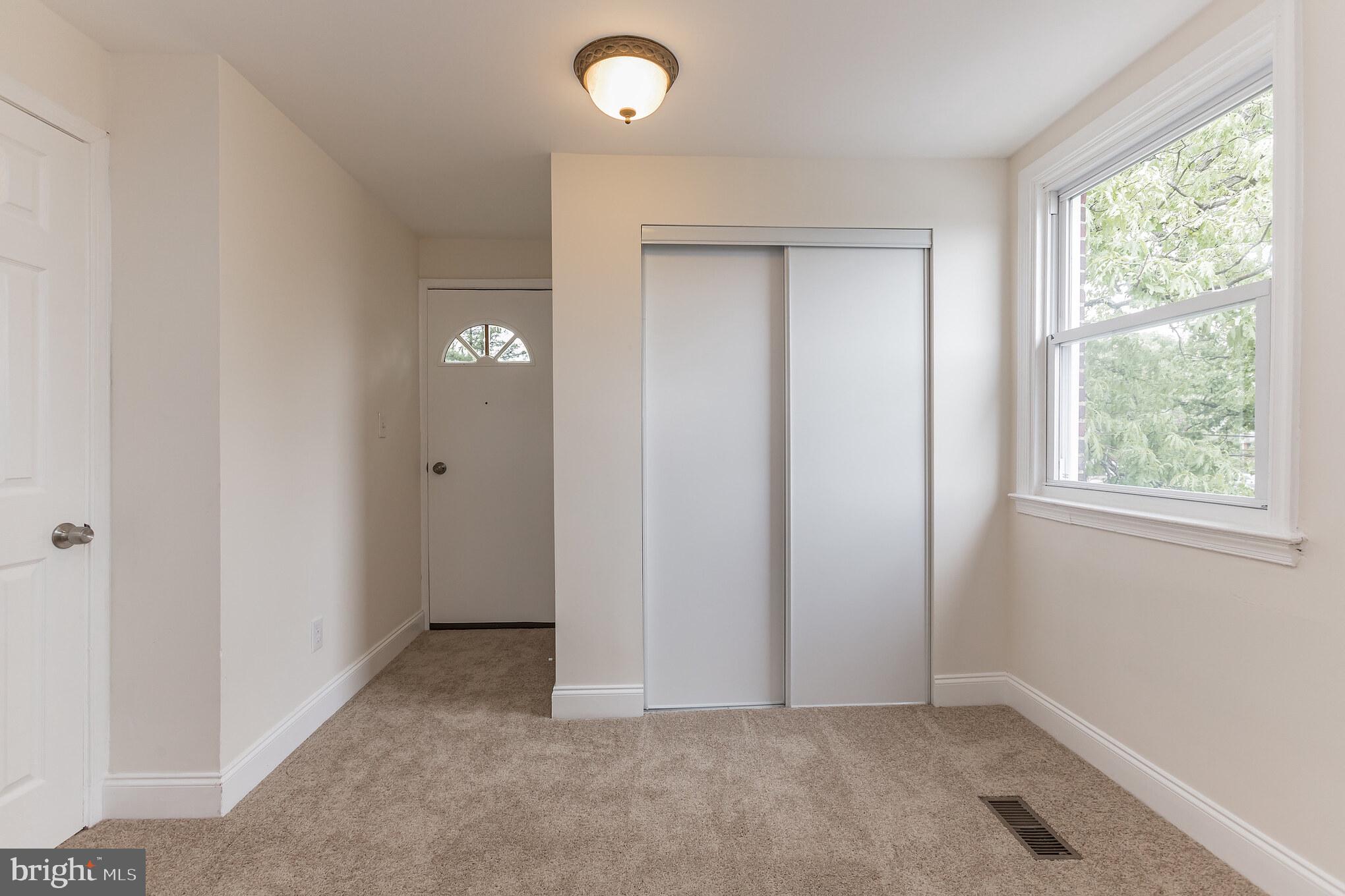 740 Charing Cross Road Baltimore, MD 21229 - Photo 16 of 29 Owners Suite Chaningroom w/Door to private Deck