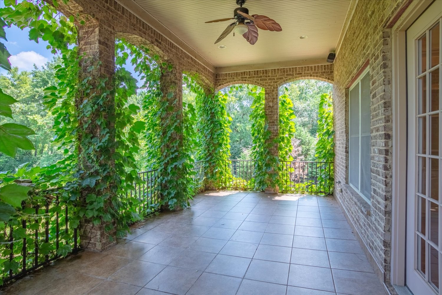 1400 Franklin Road Brentwood, TN 37027 - Photo 18 of 67 a view of an entryway with a garden