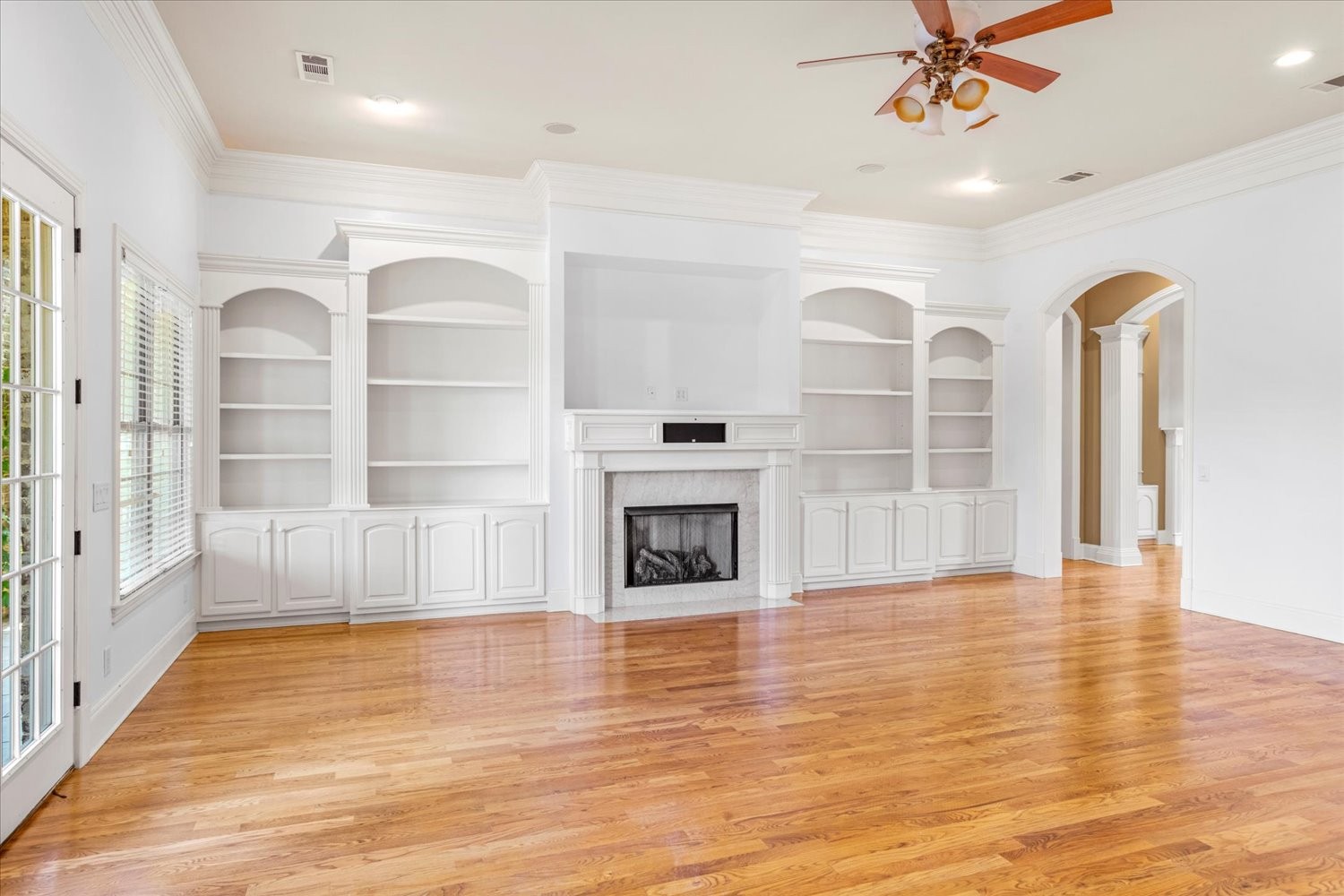 1400 Franklin Road Brentwood, TN 37027 - Photo 19 of 67 a view of a livingroom with wooden floor and a fireplace
